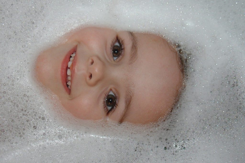 Kid taking a bath