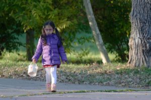 girl walking in park